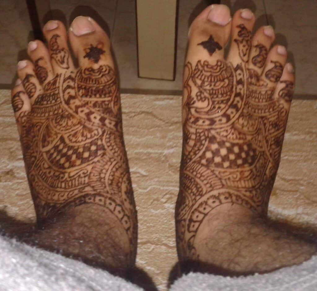 groom mehndi design for foots