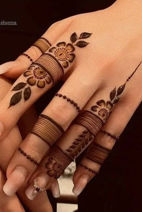 Simple Mehndi Designs for Kids Featuring Star and Heart Shapes